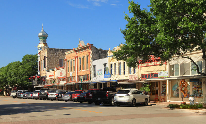 Street view of downtown Georgetown TX with restored Victorian area architecture. 